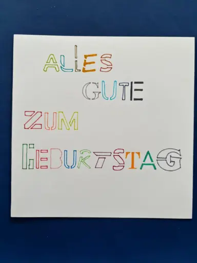 Geburtstagskarte mit farbigen Buchstaben