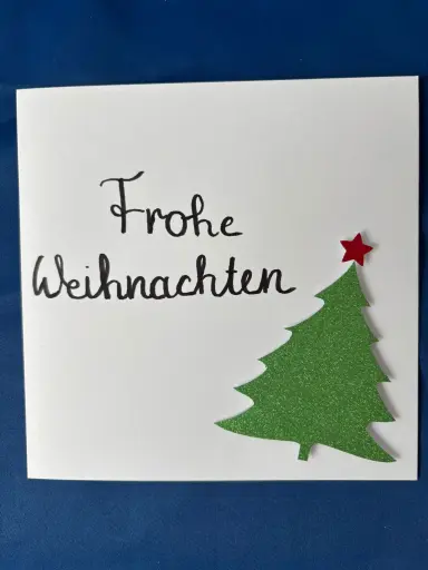 Weihnachtskarte mit glitzernden Tannenbaum